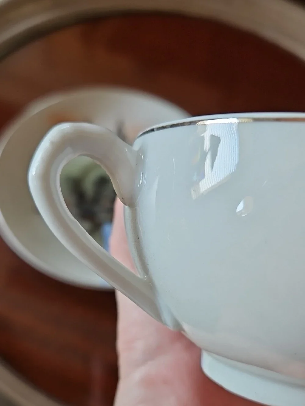 Vintage Porcelain Teacup & Saucer Set in White with Blue and Tan Accents